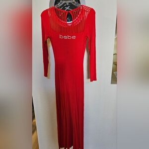 Bebe red/orange maxi dress size S. With slit in the left leg for added style